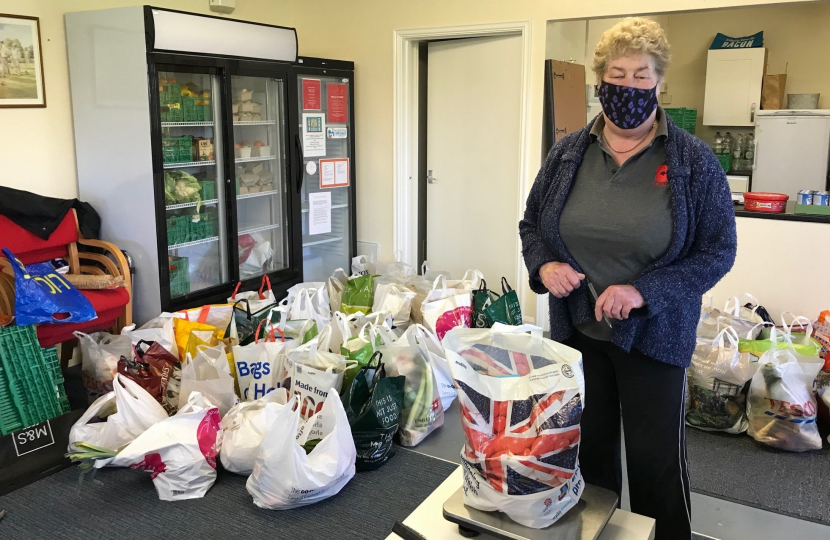 Sue with bags and weighing scales